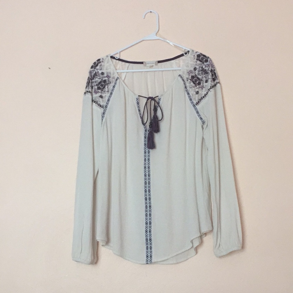 Off white boho shirt with purple detail.